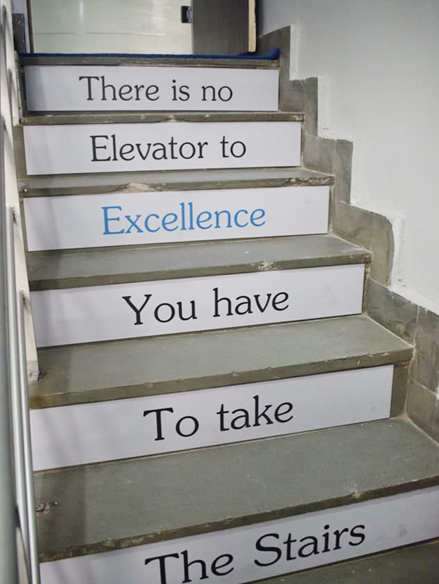 Motivational signage on the clinic stairwell